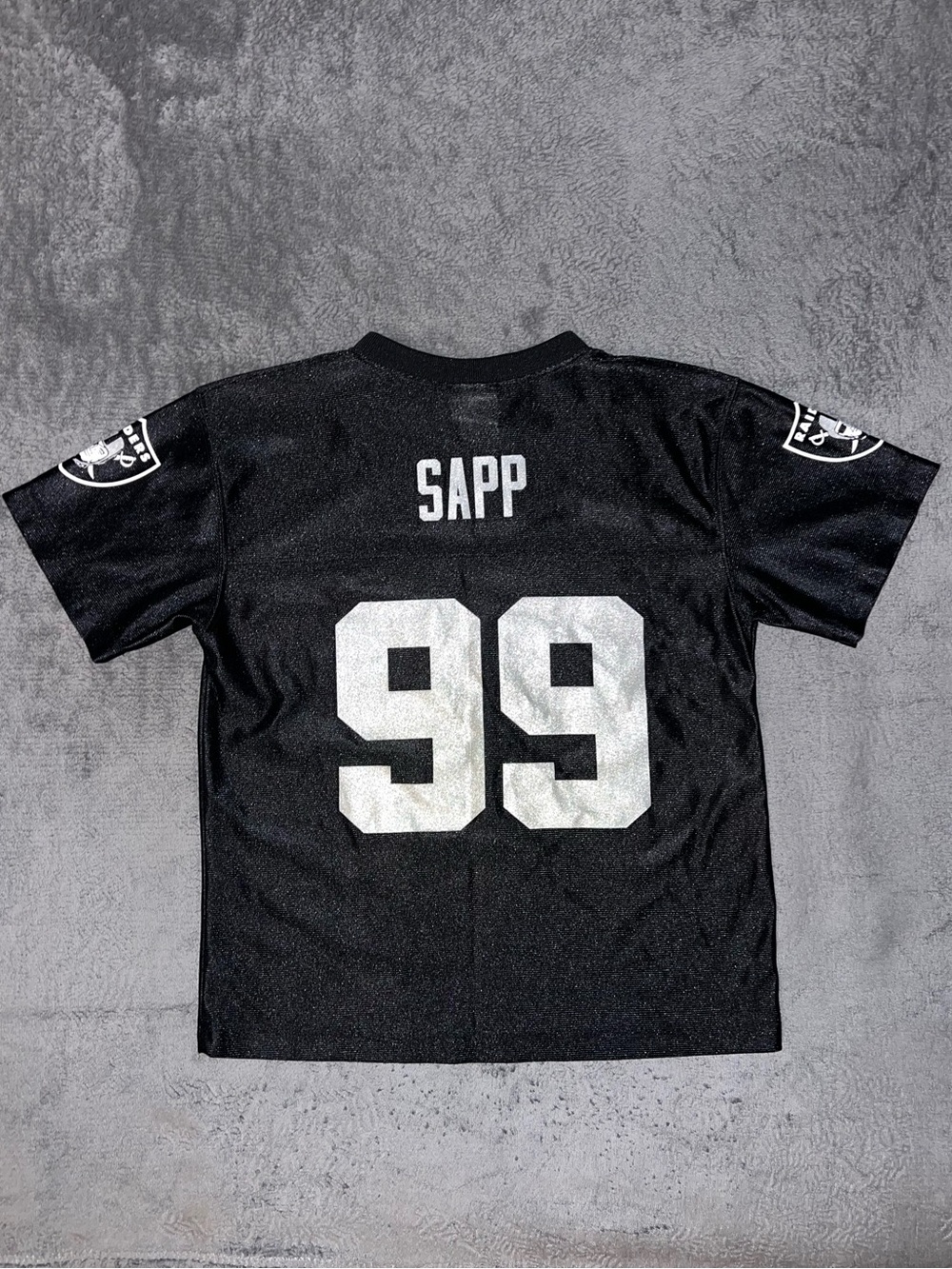 Kids’ Oakland/Las Vegas Raiders Warren Sapp #99 Black Football Jersey